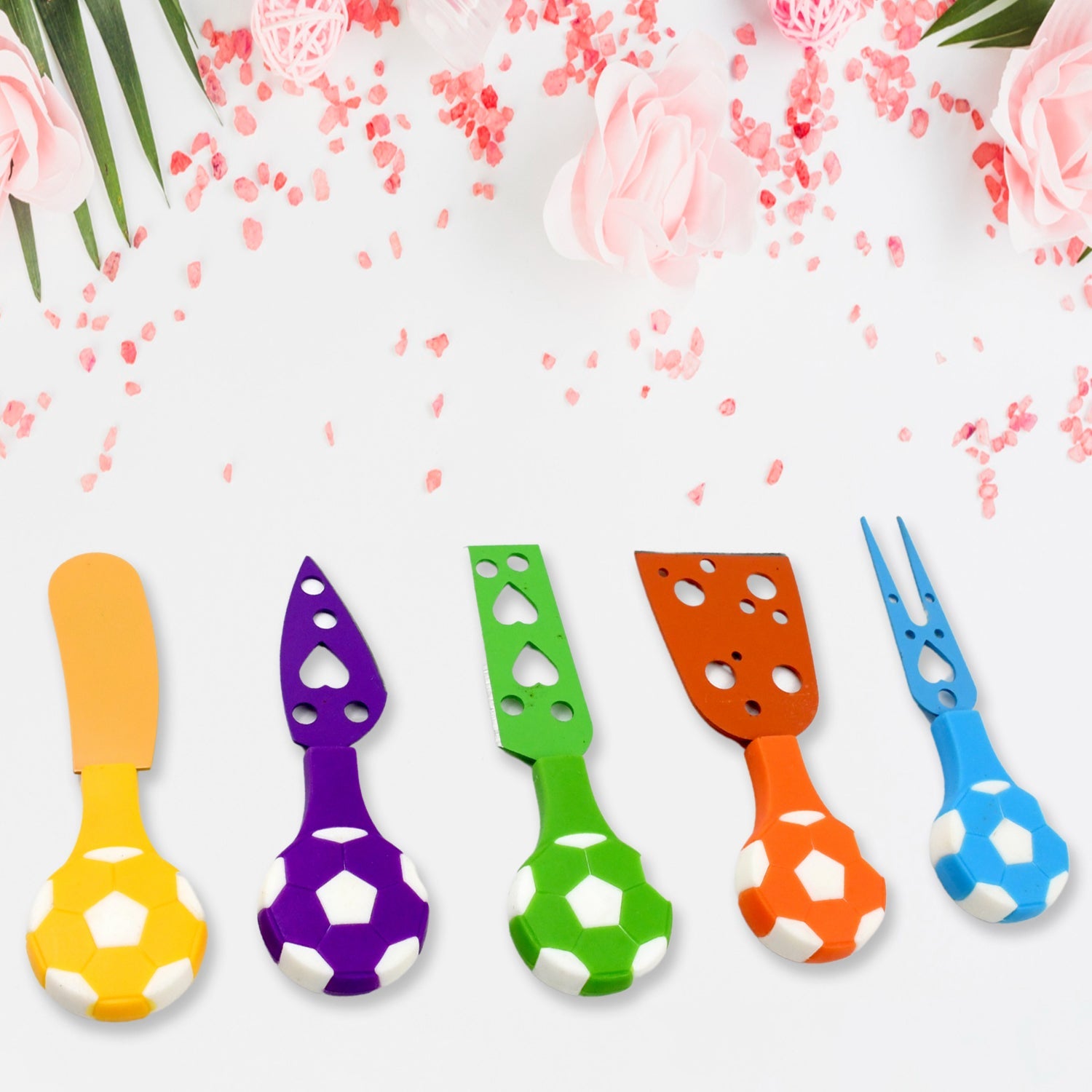 Football-shaped cheese board presented with the matching knife set.