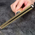 Close-up view of the lint remover's gentle round brush side, perfect for smoothing fabrics.