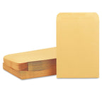Brown kraft envelope with an elegant invitation card partially inserted.