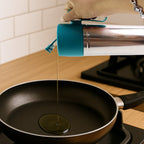 Handled stainless steel oil dispenser designed for drip-free pouring