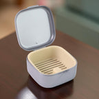 Oblivion Baby Tooth Keepsake Box in grey plastic with inner draining tray
