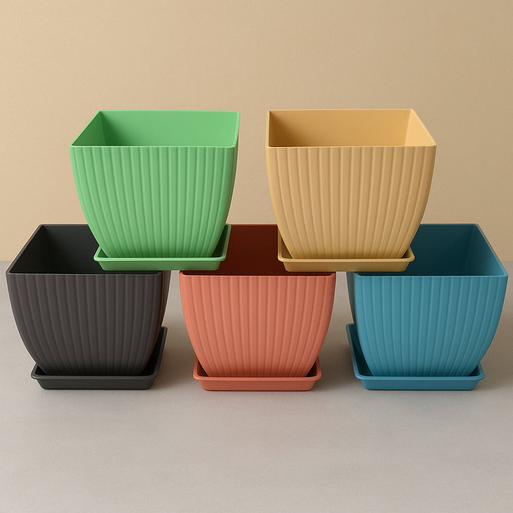 Close-up of modern square plastic planters featuring built-in drainage holes