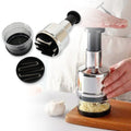 CookAura Stainless Steel Vegetable Chopper in action, slicing various vegetables.
