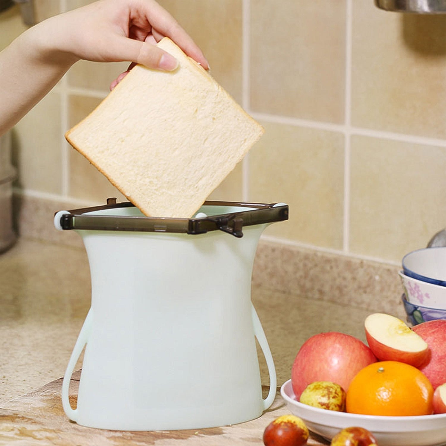 A Reusable Silicone Food Storage Bag heating food inside a microwave, showing its microwave-safe feature.