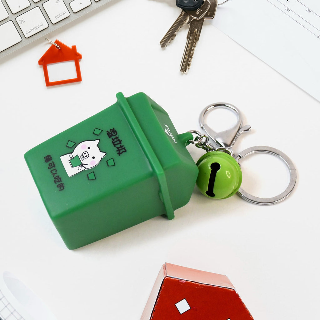 Close-up view of mini bin keychain showcasing durable plastic construction