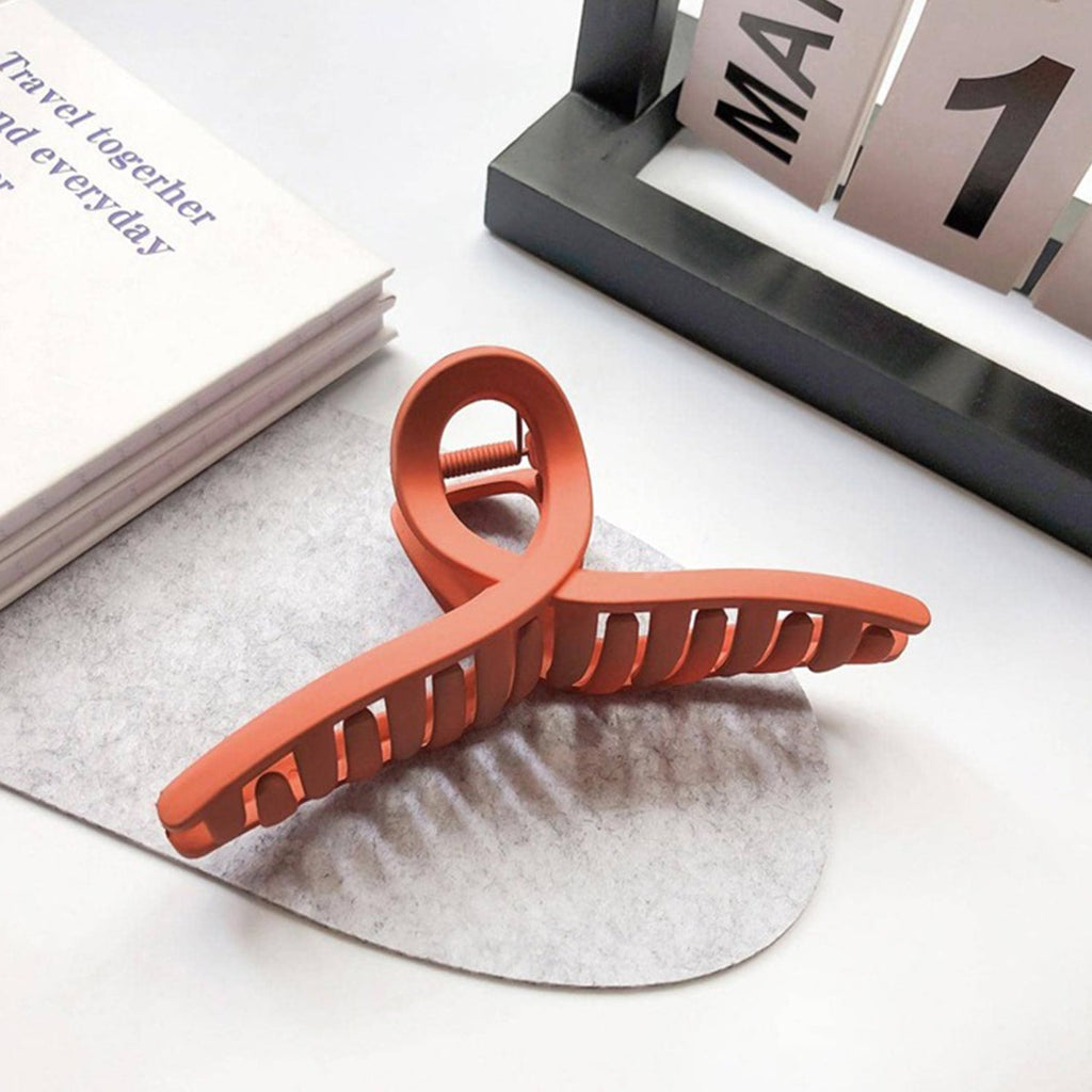 Durable plastic hair claw clips in mixed designs providing strong non-slip hold