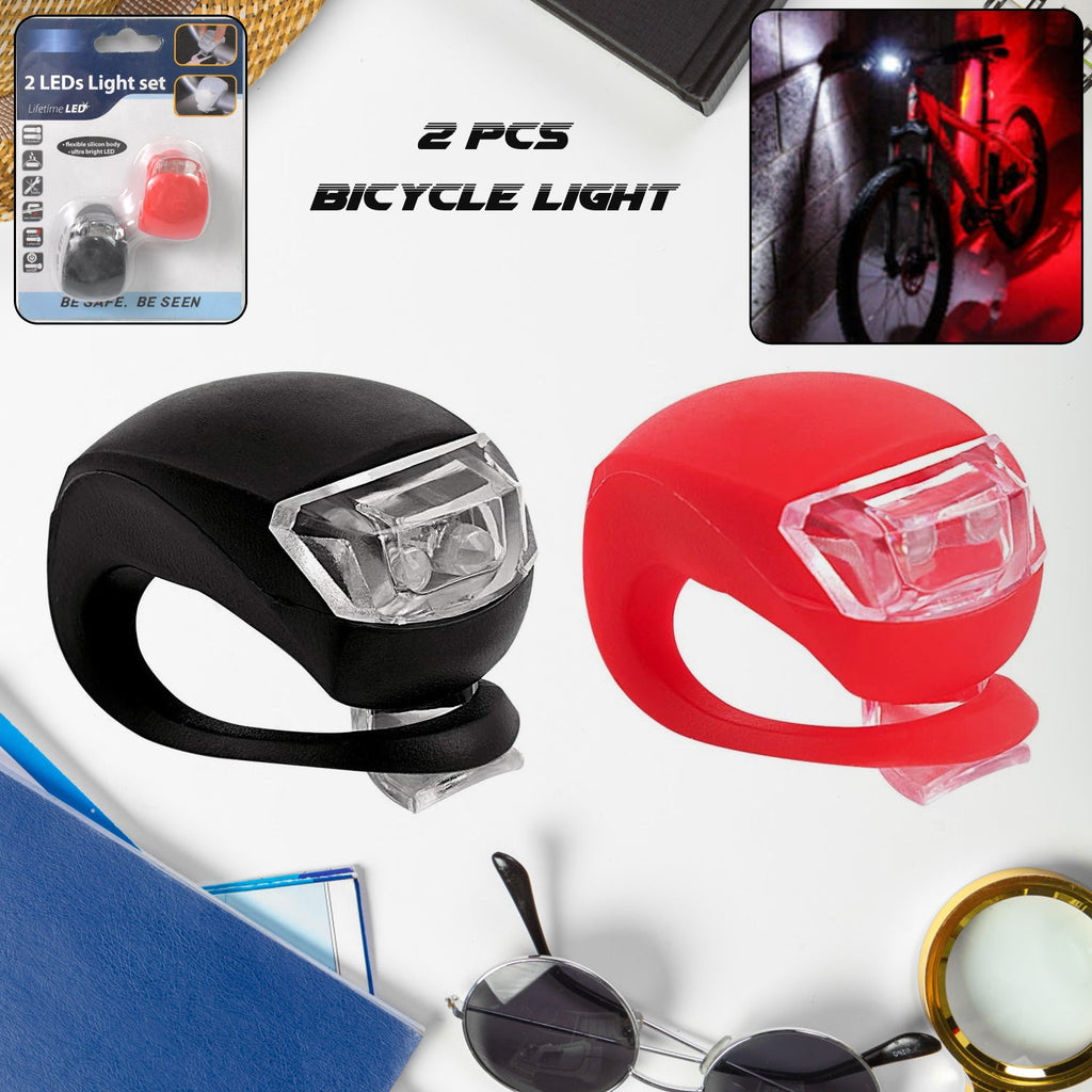 RaceVault Bike Light Set featuring a bright LED headlight mounted on a bicycle handlebar.