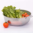 Side view of the durable stainless steel colander, highlighting its sturdy design.