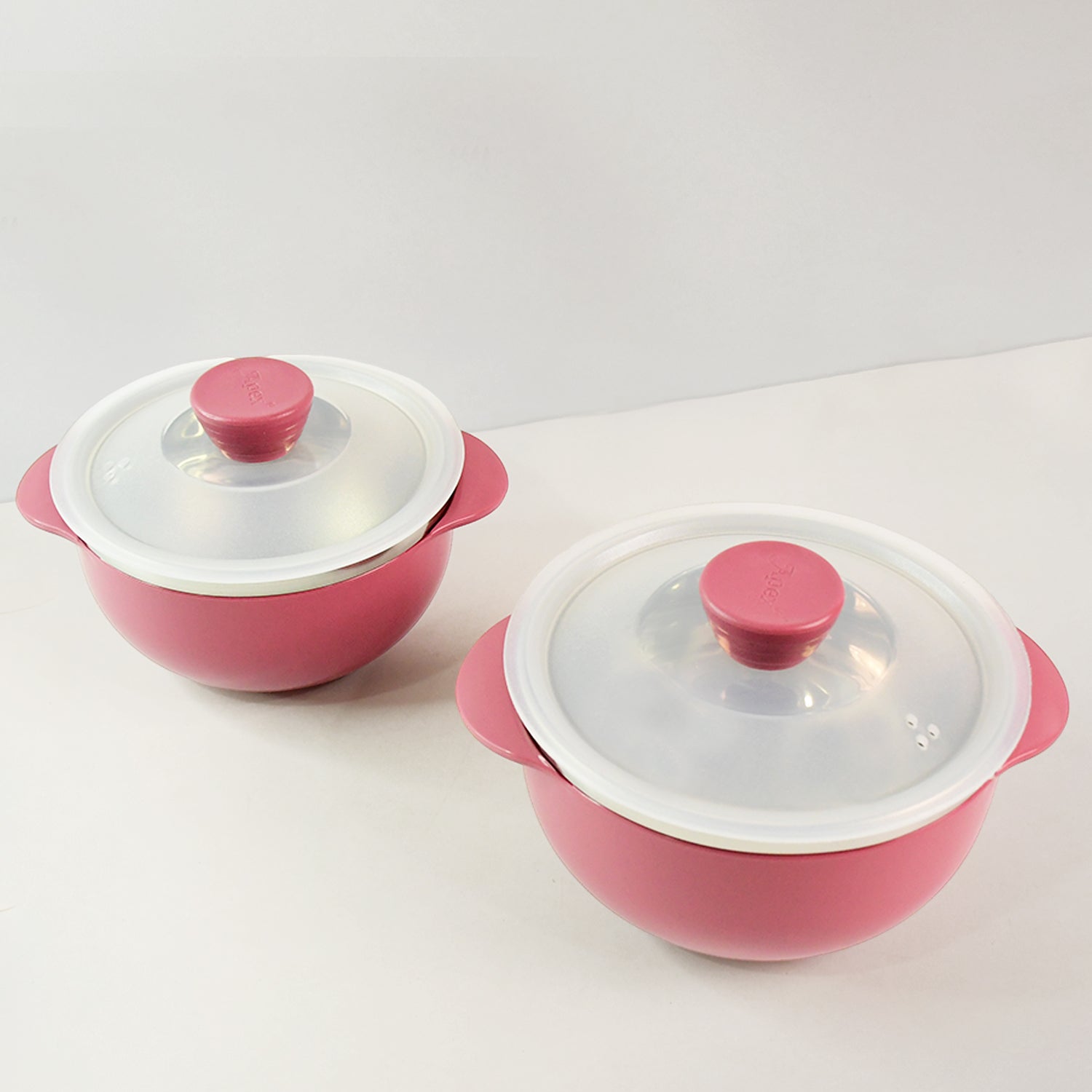 Stackable plastic serving bowls with secure lids for easy kitchen storage