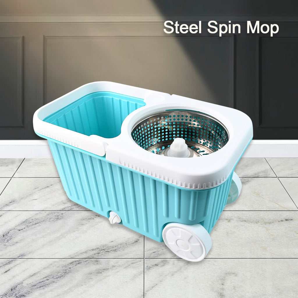 Dual-compartment bucket of spin mop showing clean and dirty water separation with drain spout