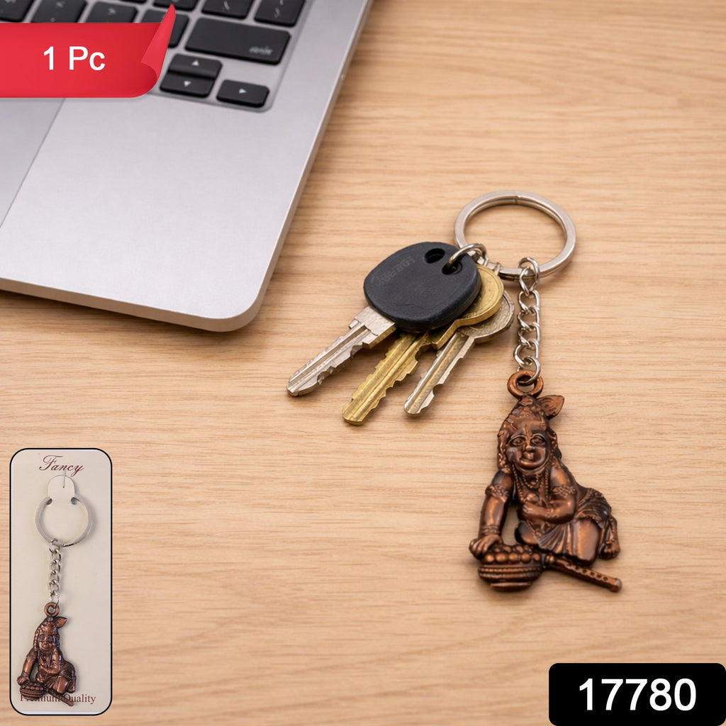 Close-up of the divine Bal Krishna butter stealing idol on keychain