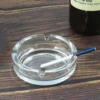 Elegant round crystal glass ashtray, perfect for modern home decor.