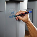 Permanent blue marker pen close-up showing ink tip