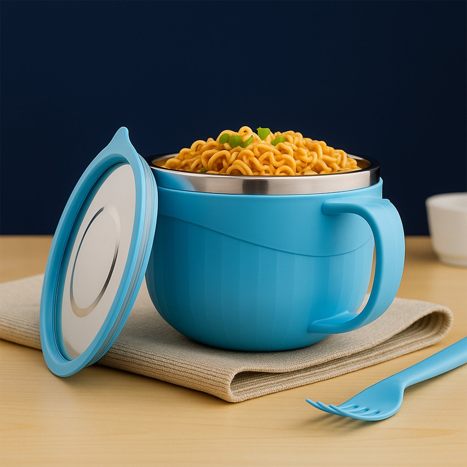 Side view of insulated noodle bowl holding steaming hot soup with handle