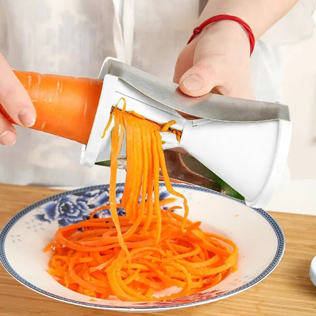 Close-up of the Quickslice spiralizer's stainless steel blades, ready for use