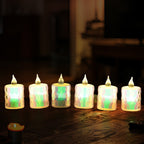 Close-up of a glowing flameless LED tea light candle in a festive setting.
