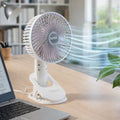 Compact portable USB fan with multifunctional stand for desktop and handheld use