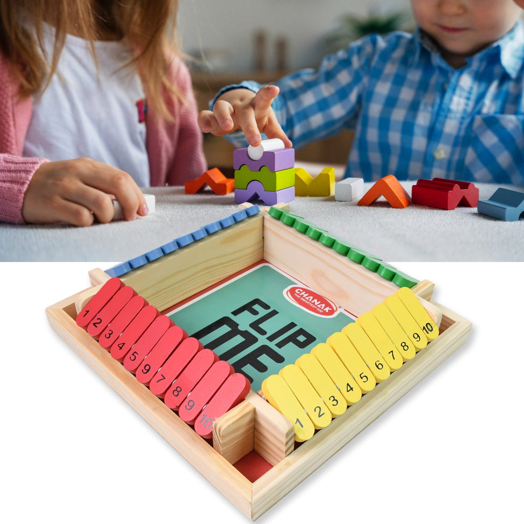 Hands rolling the dice during an engaging Shut The Box wooden game session.