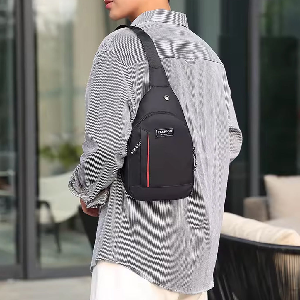 Waterproof crossbody bag in black and grey, worn across the chest.
