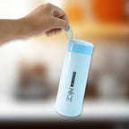 Close-up of blue capped plastic flask bottle with screw lid