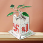 Angled shot showcasing the glossy finish of the Tulsi Idol and kalash design.