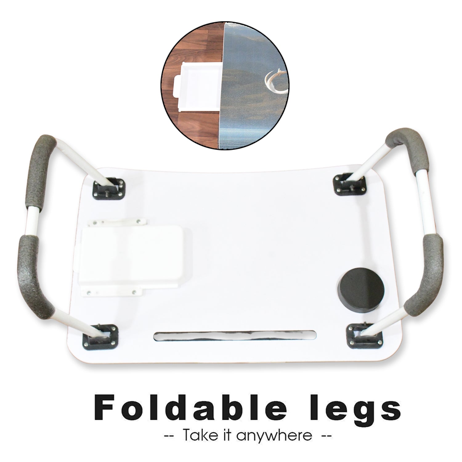 Compact foldable laptop desk shown in a comfortable bed setting.
