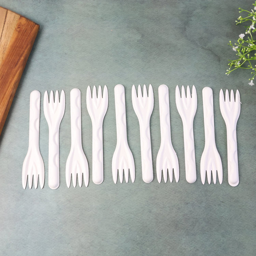 Compostable bagasse fork on table setting for eco-friendly dining