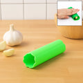 Silicone garlic peeler tube showing flexible rolling design
