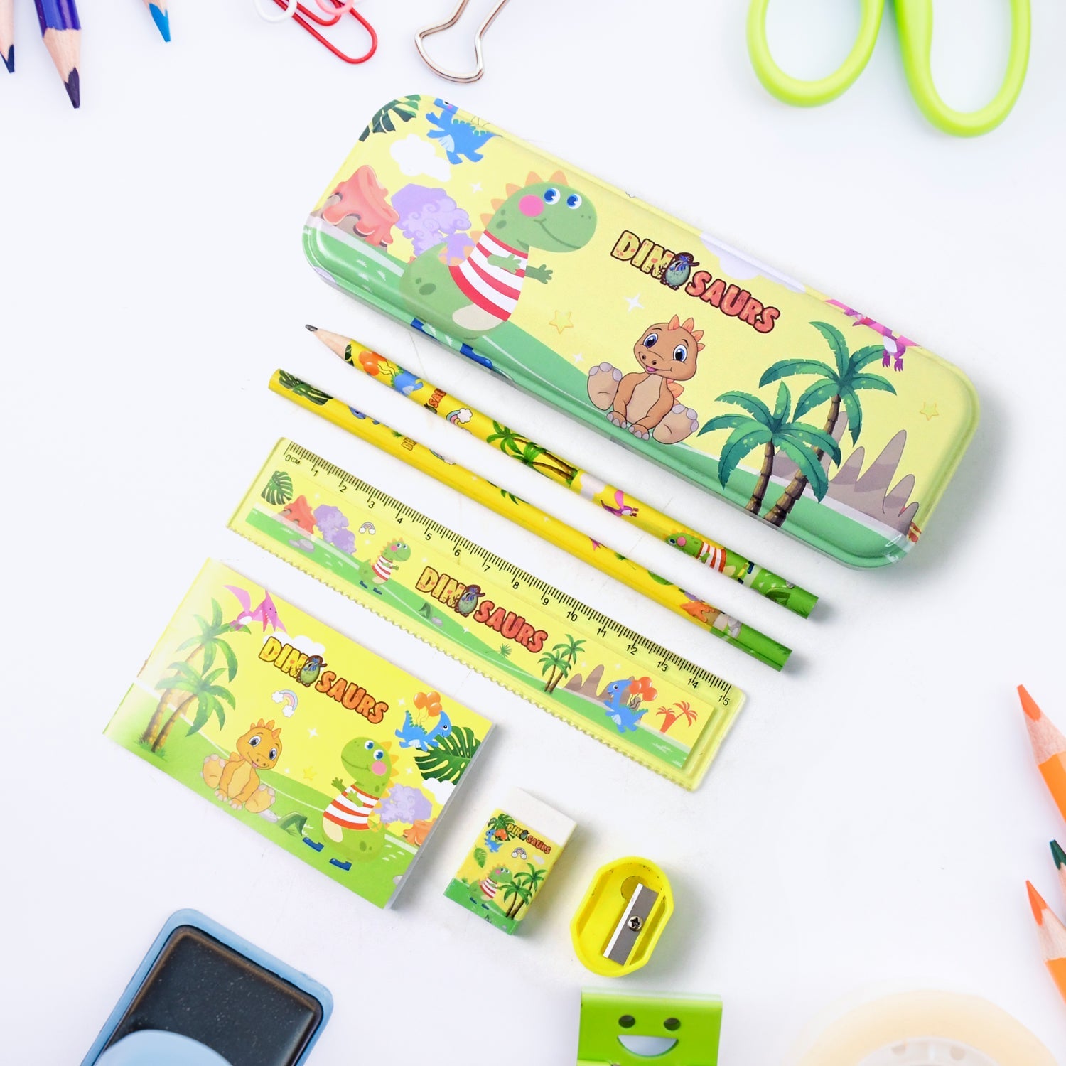 Top view of complete dinosaur kids stationery set with all items displayed
