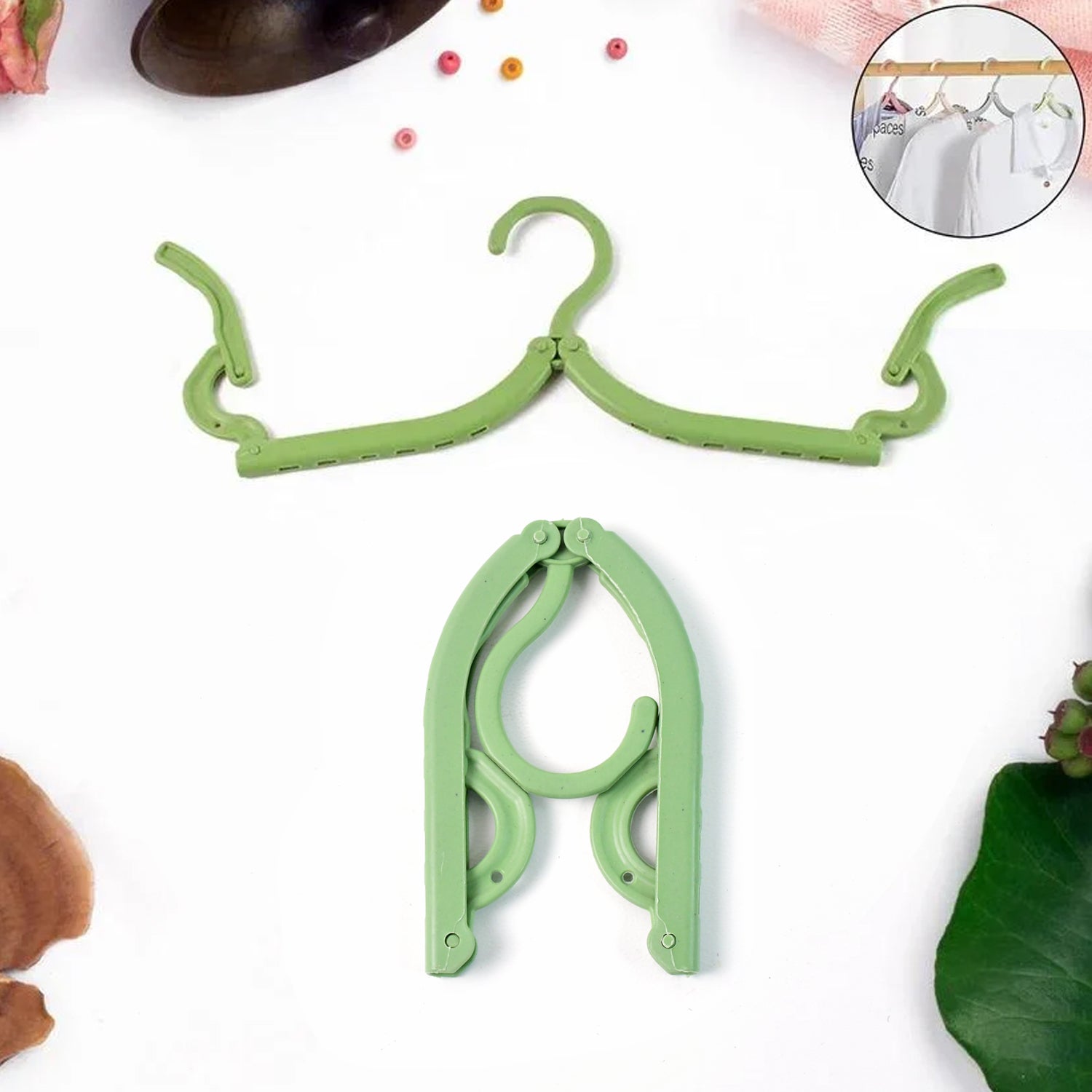 Foldable travel hanger made of durable ABS plastic, ideal for wrinkle-free clothes on the go