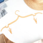 Adjustable folding clothes hanger with clips for versatile garment hanging