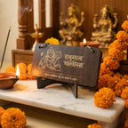 Close-up of engraved Hanuman Chalisa wooden panels showcasing devotional text