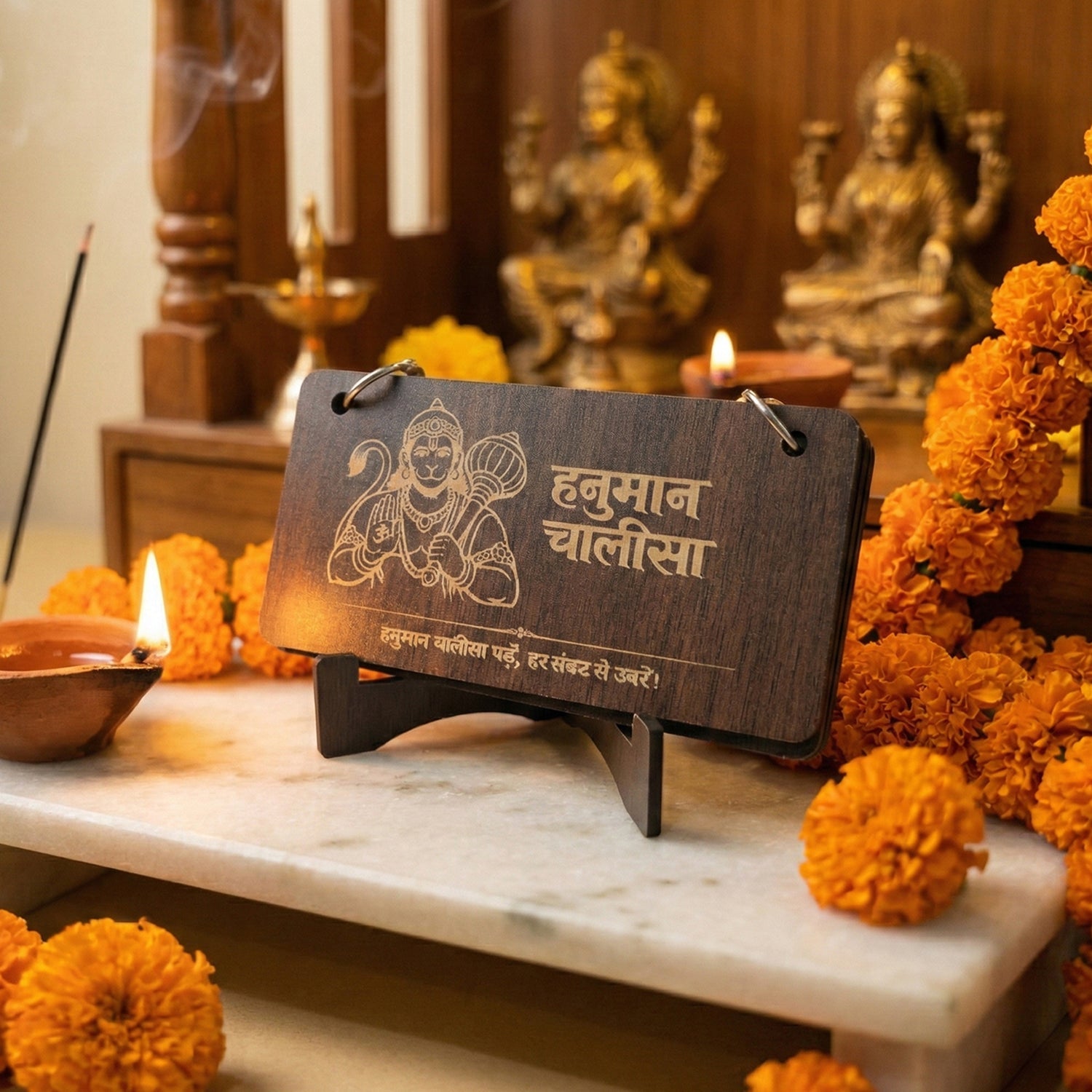 Close-up of engraved Hanuman Chalisa wooden panels showcasing devotional text