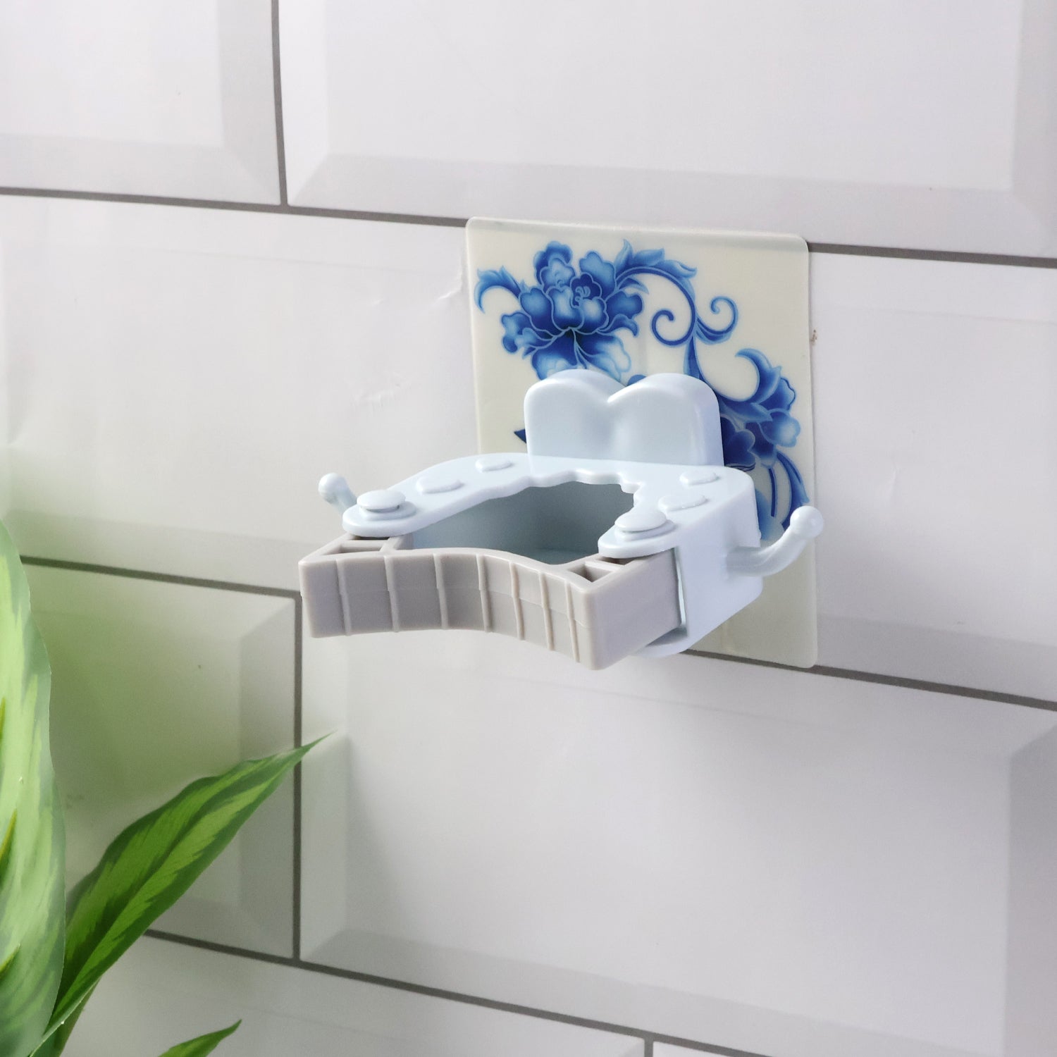 Wall mounted mop and broom holder clip holding cleaning tools on wall