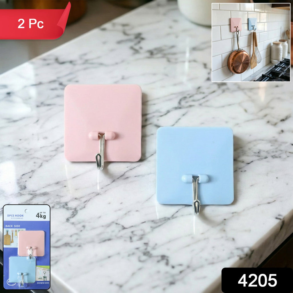 Two heavy-duty wall-mounted utility hooks side by side