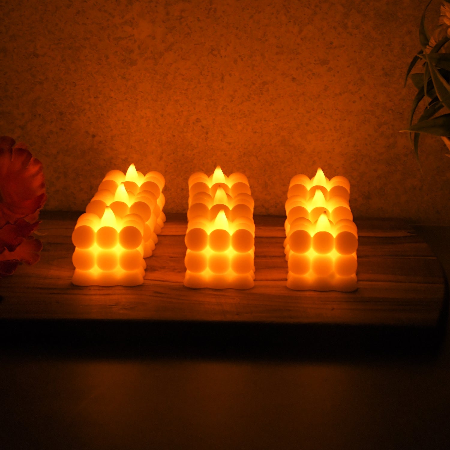 Decorative bubble-shaped LED candles glowing softly indoors