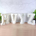Battery operated LED decorative night light glowing on table in kids room