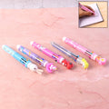 10-in-1 multicolor ball pen showing multiple ink colors