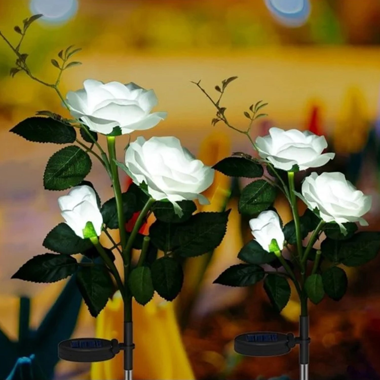 Close up of solar LED flower lights shaped like rose blossoms