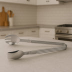 Stainless steel serving tong with spoon and fork ends for multipurpose use