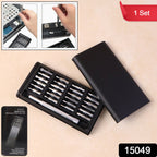 Assortment of interchangeable precision screwdriver bits laid out for various electronics repairs.