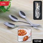 Dining spoons on a table setting showing ergonomic handles