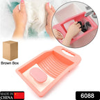 Portable socks washing board shown in use for effective cleaning.