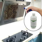 Kitchen degreaser spray effectively cleaning a greasy grill surface.