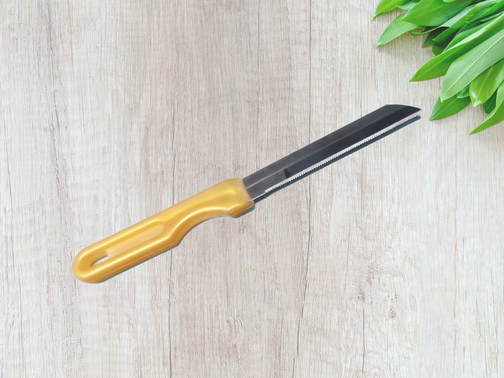 Using the stainless steel peeler from the 4-in-1 set on vegetables
