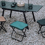 Angled view of the Folding Camping Stool, emphasizing its sturdy construction.