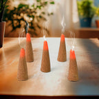 Dhoop cones arranged beautifully with flowers, enhancing a festive Indian decor.