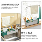 Adjustable kitchen sink organizer holding various utensils and a sponge, ready for efficient drying.