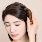 Claw-style head massager comb designed for gentle scalp stimulation