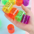 Close-up of a single, classic multicolor slinky spring toy.